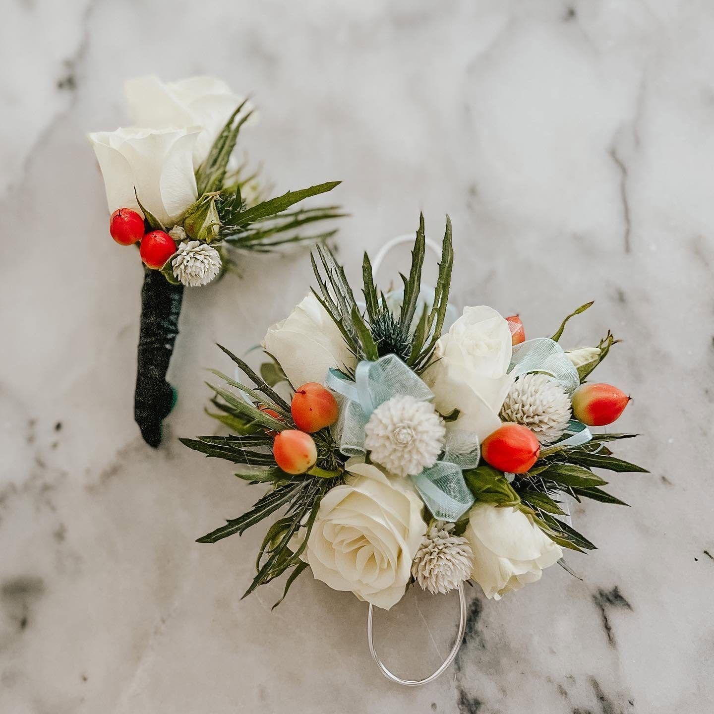 Matching boutonniere and wrist corsage set