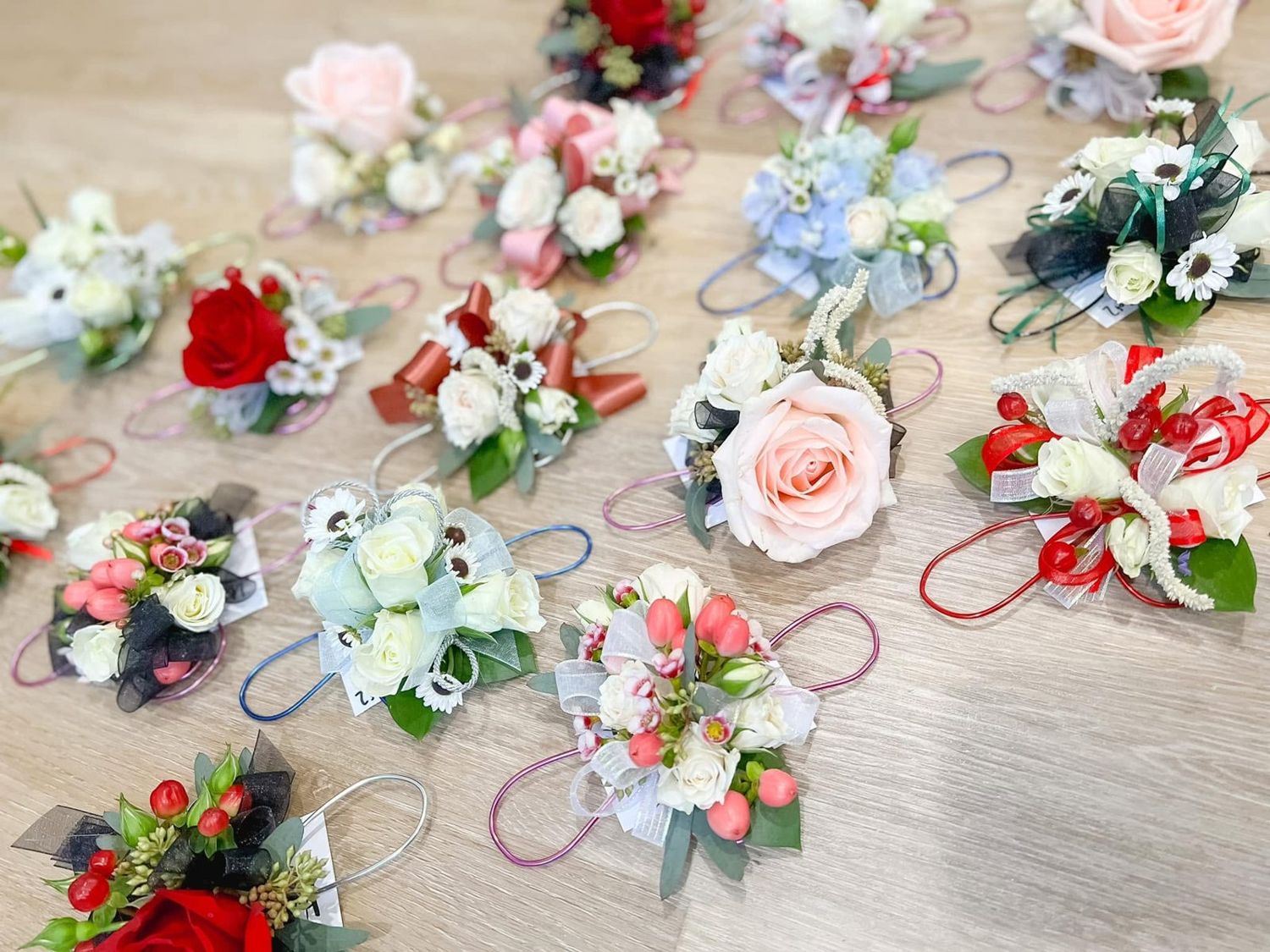 Table of custom dance corsages and boutonnieres